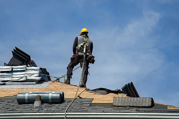 Professional Roof Replacement technician working in Clay, KY